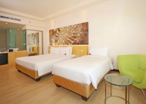 Postel nebo postele na pokoji v ubytování ANSA Hotel Kuala Lumpur