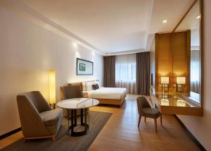 Postel nebo postele na pokoji v ubytování ANSA Hotel Kuala Lumpur