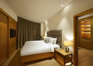 Postel nebo postele na pokoji v ubytování ANSA Hotel Kuala Lumpur