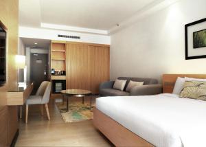 Postel nebo postele na pokoji v ubytování ANSA Hotel Kuala Lumpur