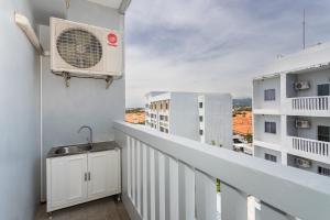 Balkón nebo terasa v ubytování Recenta Phuket Suanluang