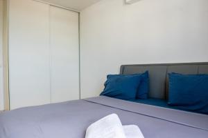 Katil atau katil-katil dalam bilik di 1B modern APT at 5min downtown Papeete and ferry