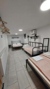 Postel nebo postele na pokoji v ubytování Apartma Licko
