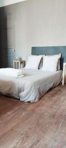 Postel nebo postele na pokoji v ubytování Artbnb