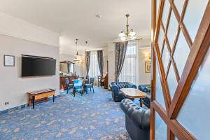TV a/nebo společenská místnost v ubytování Hotel Diament Plaza Gliwice