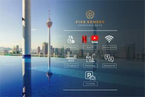 une vue sur une ville avec un gratte-ciel en arrière-plan dans l'établissement The Colony & The Luxe, Kuala Lumpur by Canopy Lives, à Kuala Lumpur