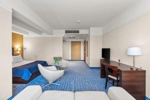TV a/nebo společenská místnost v ubytování Hotel Diament Plaza Gliwice