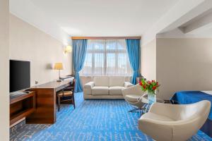 TV a/nebo společenská místnost v ubytování Hotel Diament Plaza Gliwice