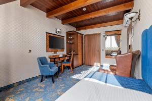 Postel nebo postele na pokoji v ubytování Hotel Diament Plaza Gliwice