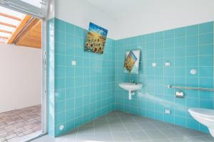 Koupelna v ubytování Farma Slunečný Dvůr apartmány a family stany střecha pod střechou