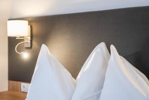 Łóżko lub łóżka w pokoju w obiekcie Apartments Untersüßgut Eben
