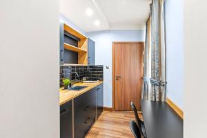 Kuchyň nebo kuchyňský kout v ubytování Hotel Diament Plaza Gliwice