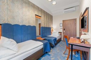 TV a/nebo společenská místnost v ubytování Hotel Diament Plaza Gliwice