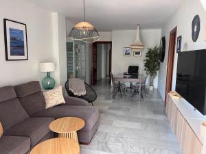 Et tv og/eller underholdning på Apartamento Oasis La Herradura