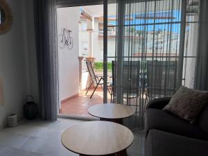 Et opholdsområde på Apartamento Oasis La Herradura