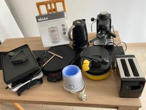 Příslušenství pro přípravu čaje a kávy v ubytování Appart familial, jeux et matériel enfants, fitness