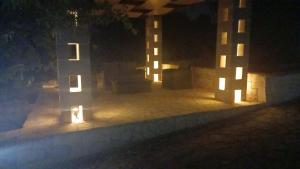 a group of lights on a patio at night at Villa Apollonia B&B in Monopoli