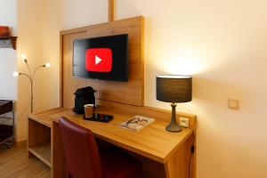TV/Unterhaltungsangebot in der Unterkunft Zum Treppche Hotel Garni