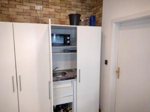 Küche/Küchenzeile in der Unterkunft Zum Treppche Hotel Garni