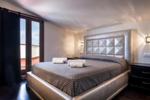 Posteľ alebo postele v izbe v ubytovaní Hotel Montmar