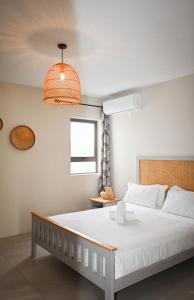 Postel nebo postele na pokoji v ubytování Bois Mapou Self Catering Apartments Unit 101 + 37 fotografií