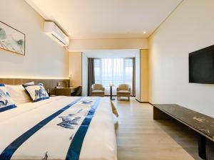 Et tv og/eller underholdning på Guangzhou Qiling Hotel