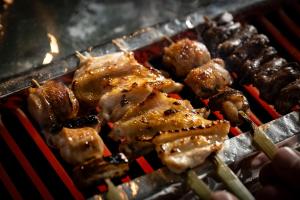 a grill with meat and other foods on it at The Prince Park Tower Tokyo - Preferred Hotels & Resorts, LVX Collection in Tokyo