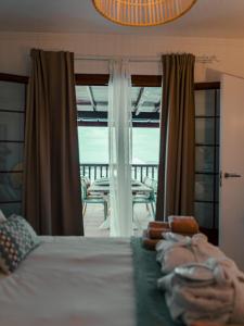 Łóżko lub łóżka w pokoju w obiekcie Lanzarote Villa Ascanio