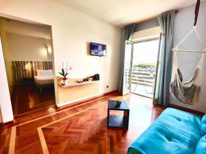 TV a/nebo společenská místnost v ubytování HA Hotel