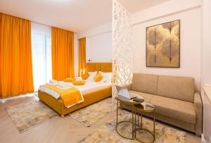 En eller flere senge i et værelse på Sea On