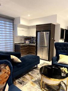 Kuchyň nebo kuchyňský kout v ubytování Blue Apartment