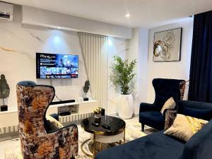 TV a/nebo společenská místnost v ubytování Blue Apartment