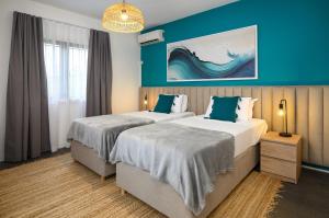 Postel nebo postele na pokoji v ubytování Wild Pearl, Albion Mauritius