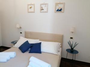 Postel nebo postele na pokoji v ubytování B&B Capo Le Vigne