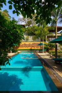 Bazén v ubytování Villa Rumassala Luxury Chalets Unawatuna nebo v jeho okolí