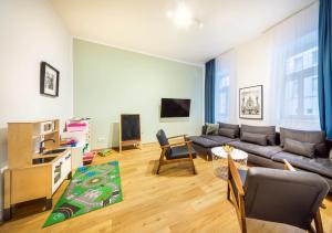 TV a/nebo společenská místnost v ubytování Jimmys Apartments XXL