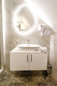Koupelna v ubytování Garni Hotel Leopold I + 33 fotografií