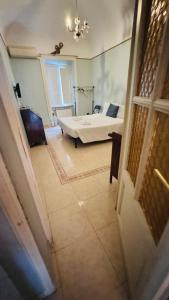 a view of a bedroom with a bed and a window at apt via cernaia rome center in Rome