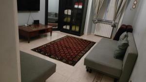 a living room with a couch and a table at apt via cernaia rome center in Rome