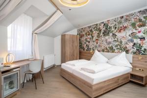 Postel nebo postele na pokoji v ubytování Hotel Kongress