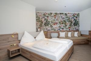 Una cama o camas en una habitación de Hotel Kongress