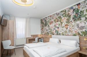 Postel nebo postele na pokoji v ubytování Hotel Kongress