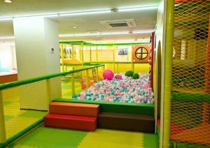 a room full of balls in a ball pit at Rycom Family Resort Hotel in Okinawa City +208 photos
