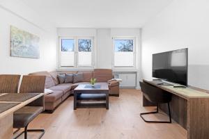 Televisyen dan/atau pusat hiburan di Lünen Living Apartments #10