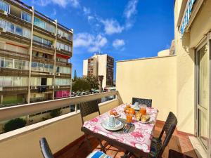 a balcony with a table and chairs on a balcony at Vilamoura Central 10 by Homing in Vilamoura