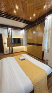 Postel nebo postele na pokoji v ubytování Siris Luxury Cottage