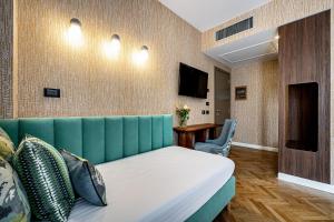 TV a/nebo společenská místnost v ubytování Hotel Duomo Firenze