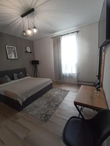 Ένα ή περισσότερα κρεβάτια σε δωμάτιο στο Ted’s one