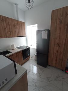 Η κουζίνα ή μικρή κουζίνα στο Ted’s one