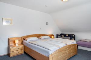 Postel nebo postele na pokoji v ubytování Unterfalkenhof
